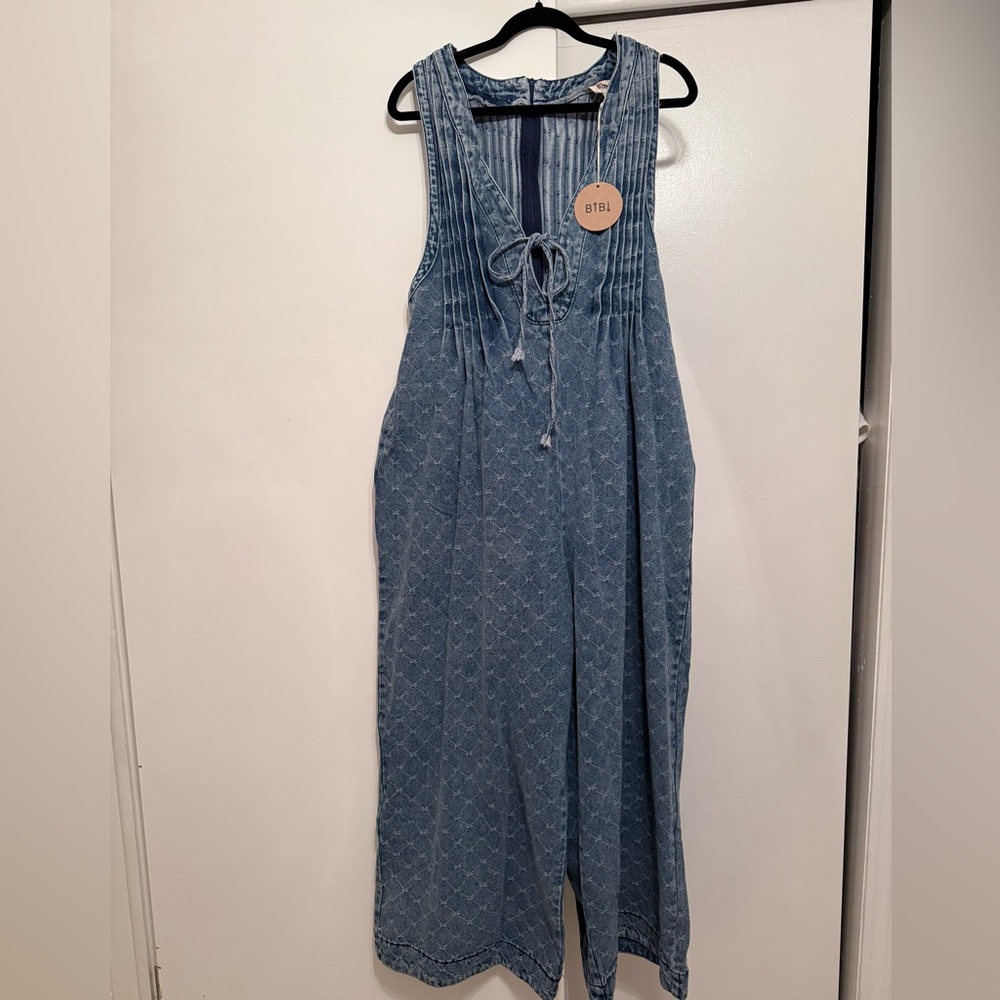 BiBi Blue Wide-Leg Jumpsuit with Subtle Pattern